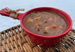 Beef Stew in red bowl with handle